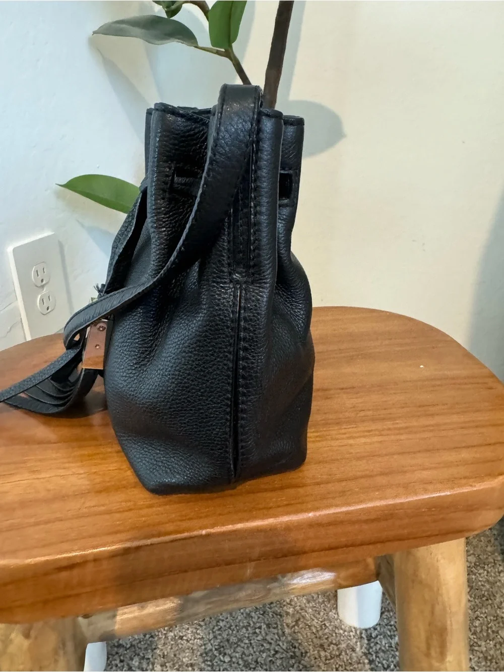 kate spade black pebbled leather tassel drawstring crossbody bag
